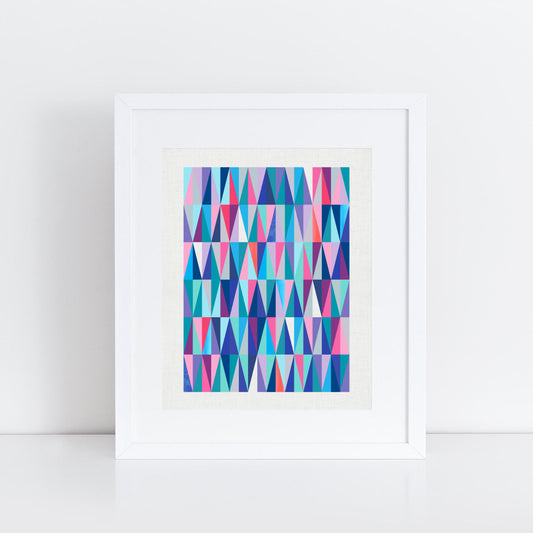 colourful, playful geometric prints of diamonds and triangles in a mix of blue, pink and purple shades