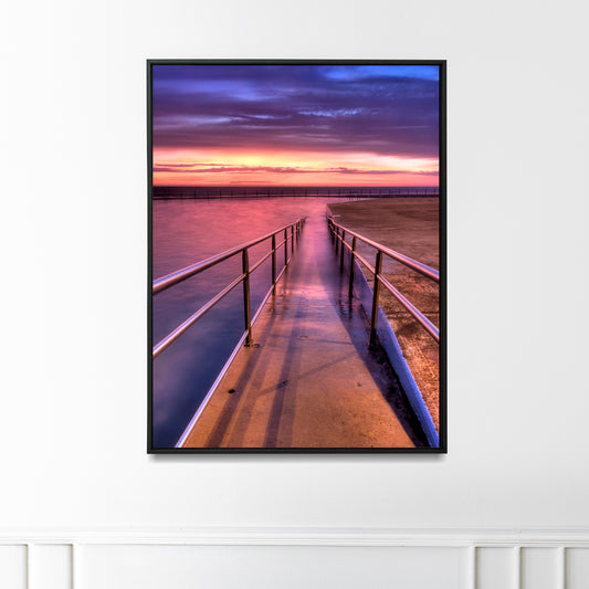 photograph on a wall of A colourful morning at Coogee Beach ocean rock pool