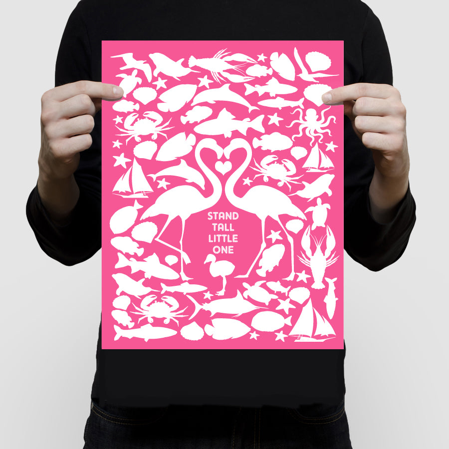 person holding signature guest book poster at baby shower With two fabulous flamingos and a little baby flamingo plus scattering of sea creatures and boats