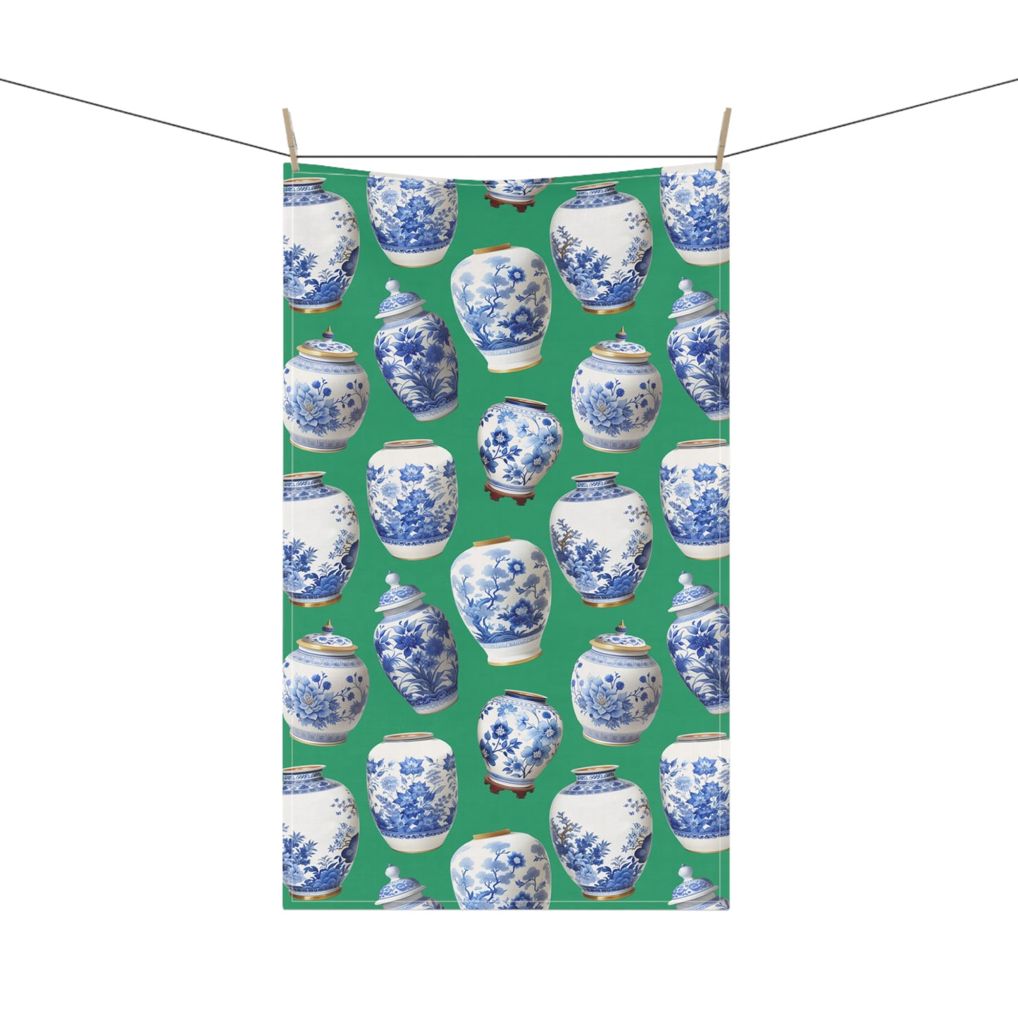 gorgeous tea towel, featuring blue and white ginger jars set against a vibrant green background.