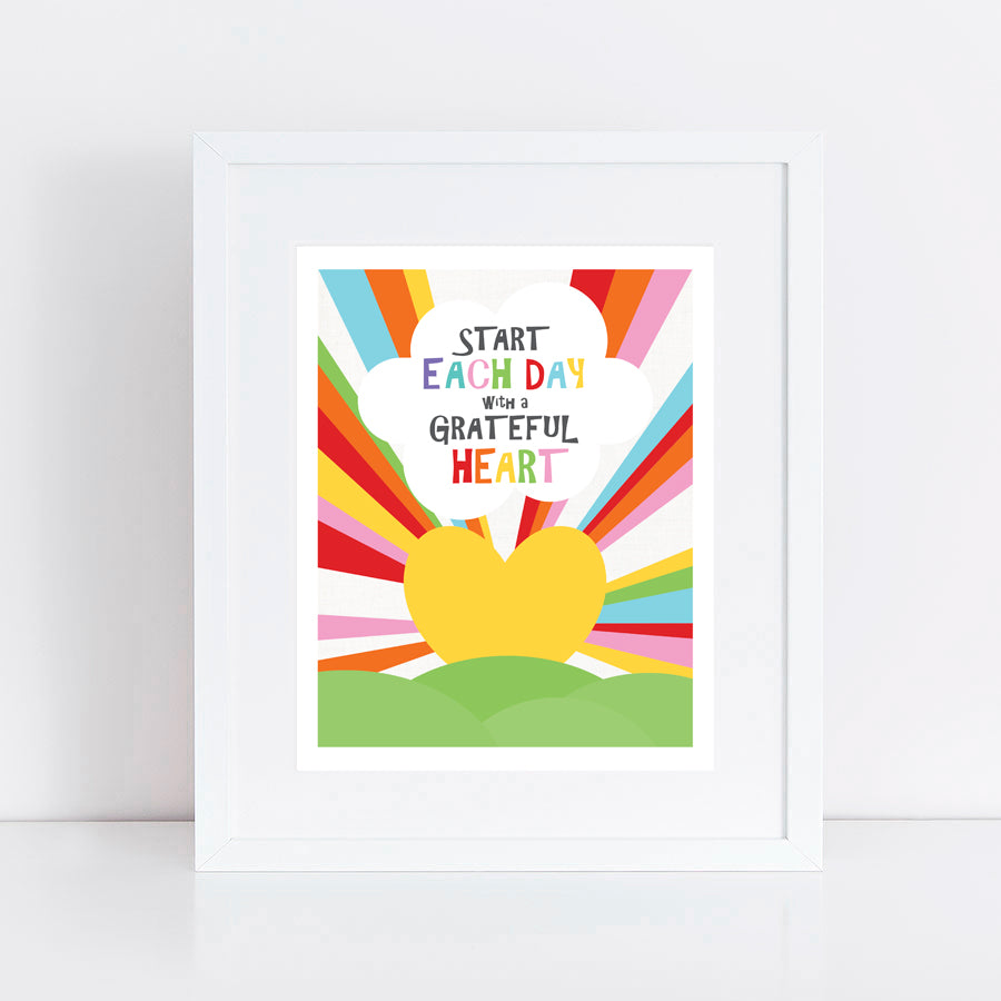 print of a sunrise heart with rainbow beams of light and quote Start each day with a grateful heart
