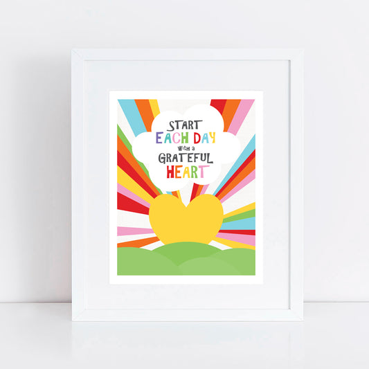 print of a sunrise heart with rainbow beams of light and quote Start each day with a grateful heart 