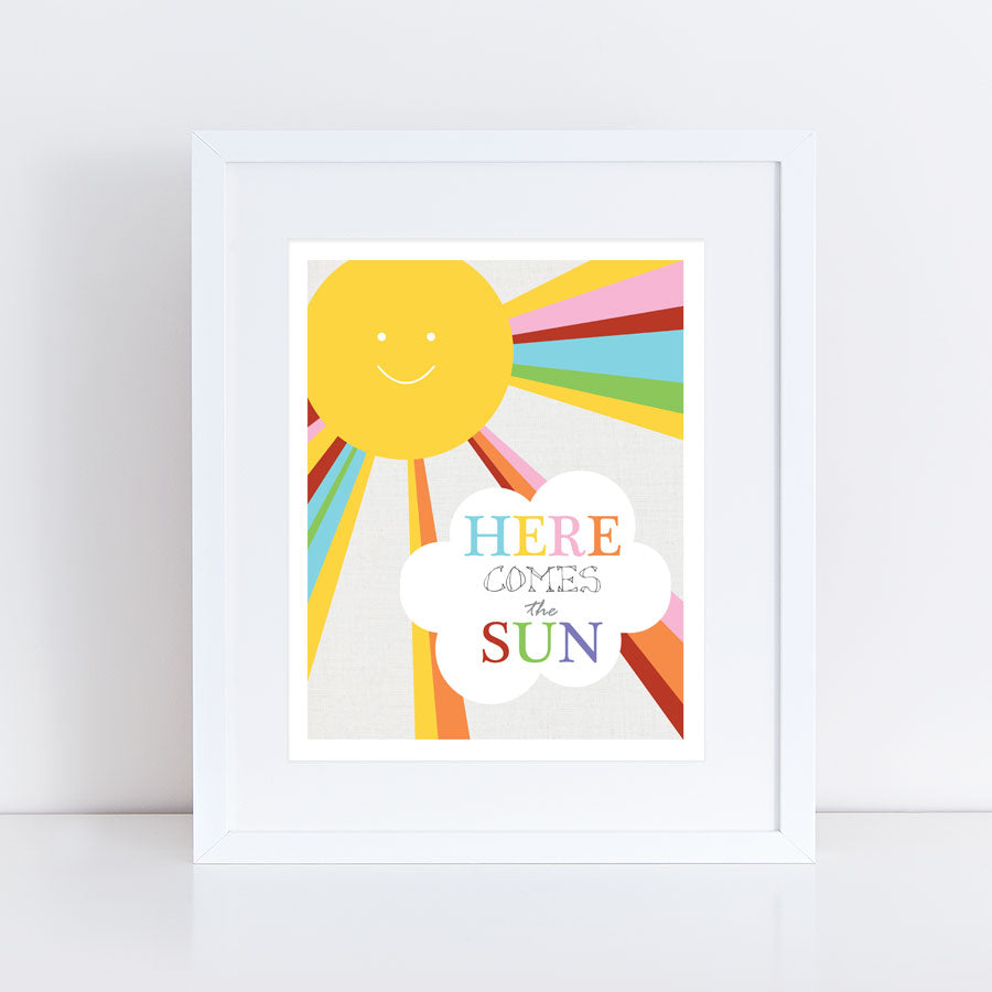 colourful artwork of sunshine and a cloud with here comes the sun