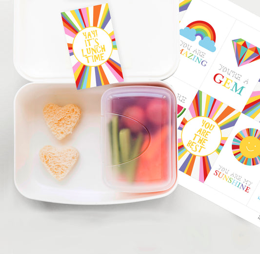 cute little lunch box notes for kids with positive messages and illustrations scattered around a lunch box