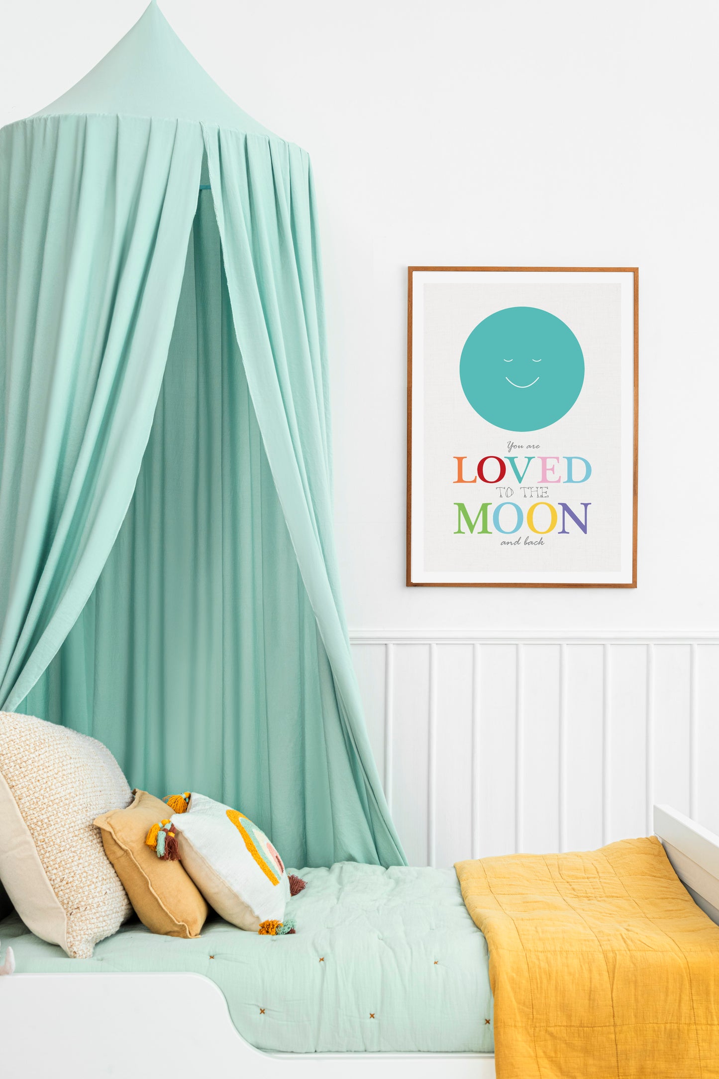 Teal and mustard colourful kids bedroom with canopy and moon print
