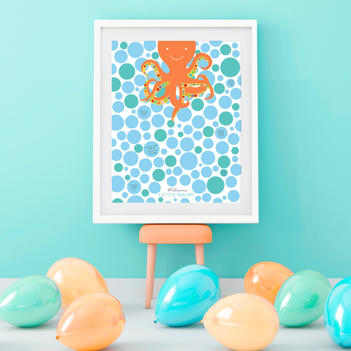 octopus print framed at a baby shower party in turquoise room with balloons