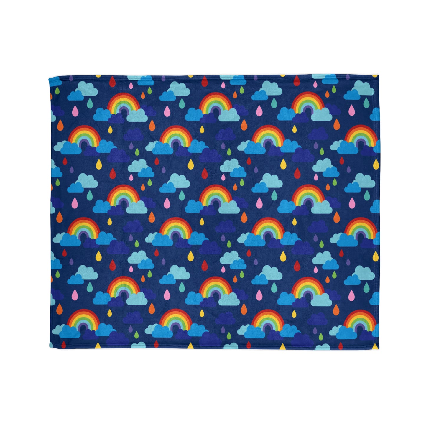 vibrant throw blanket with a design that features colourful rainbows, playful raindrops, and fluffy clouds set against a deep blue background