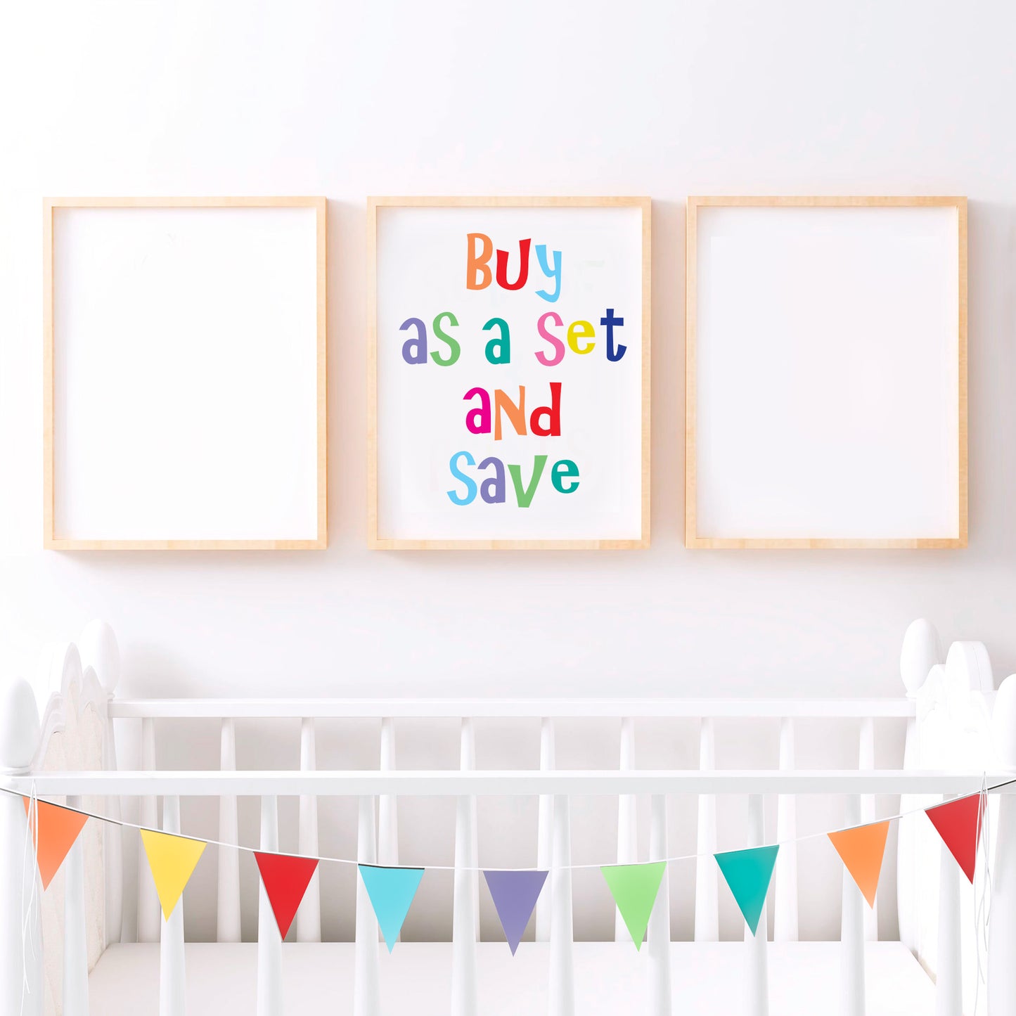 Set of three artworks above a crib for people to choose their own set of prints