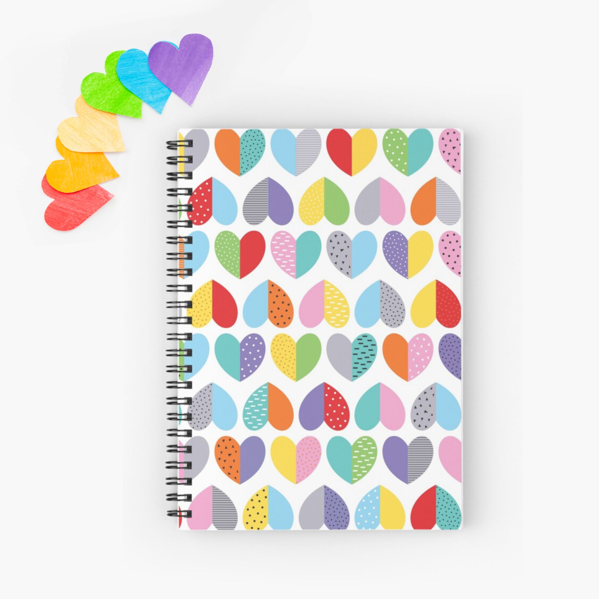 cute and colourful spiral notebook with love heart pattern on the front cover