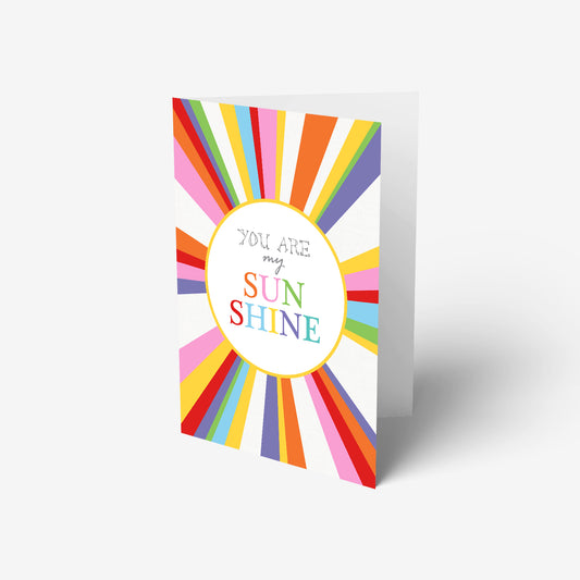 A beautiful greeting card with rainbow sun and positive message You are my sunshine. 