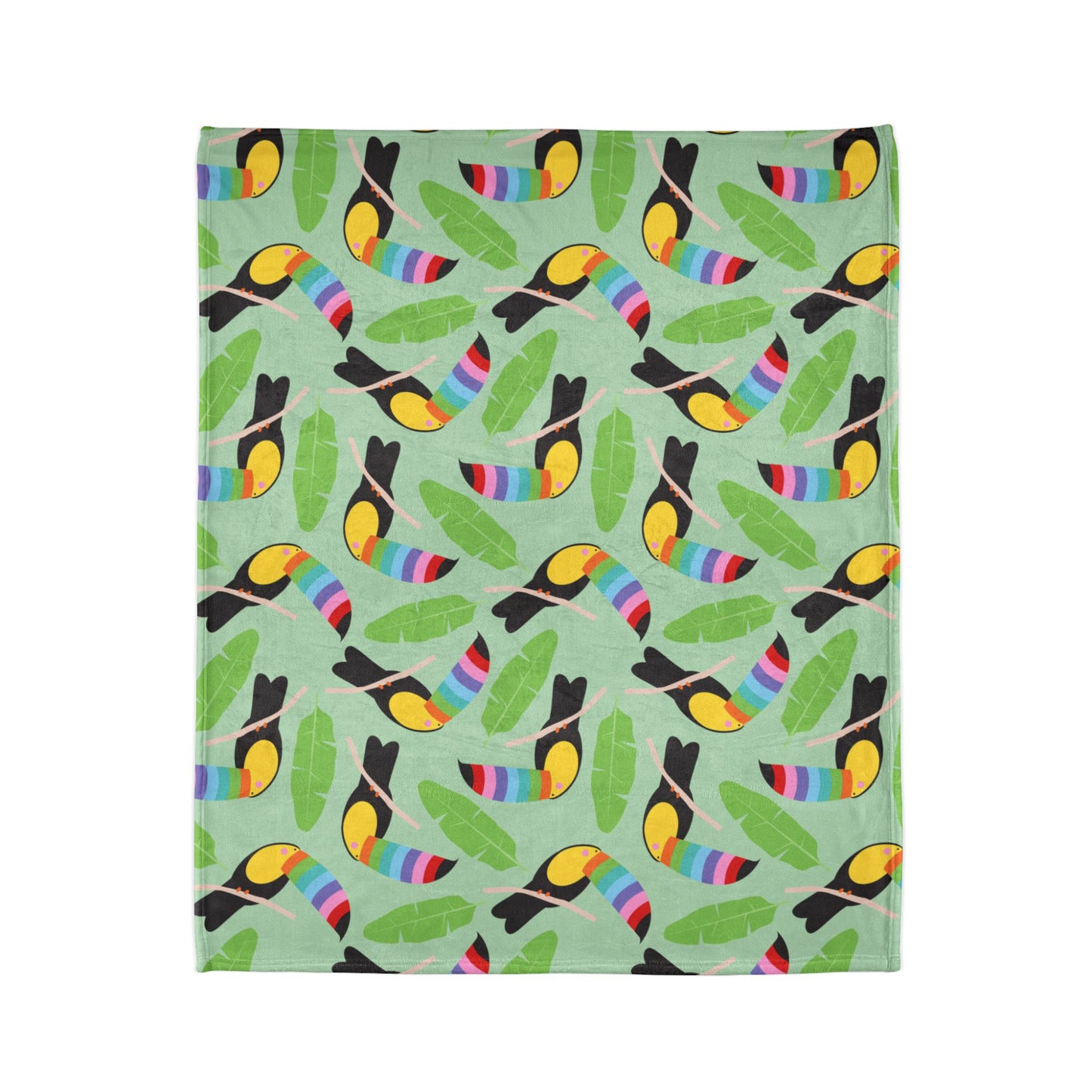 vibrant throw blanket, featuring a playful pattern of colourful toucans perched among lush green leaves on a mint background