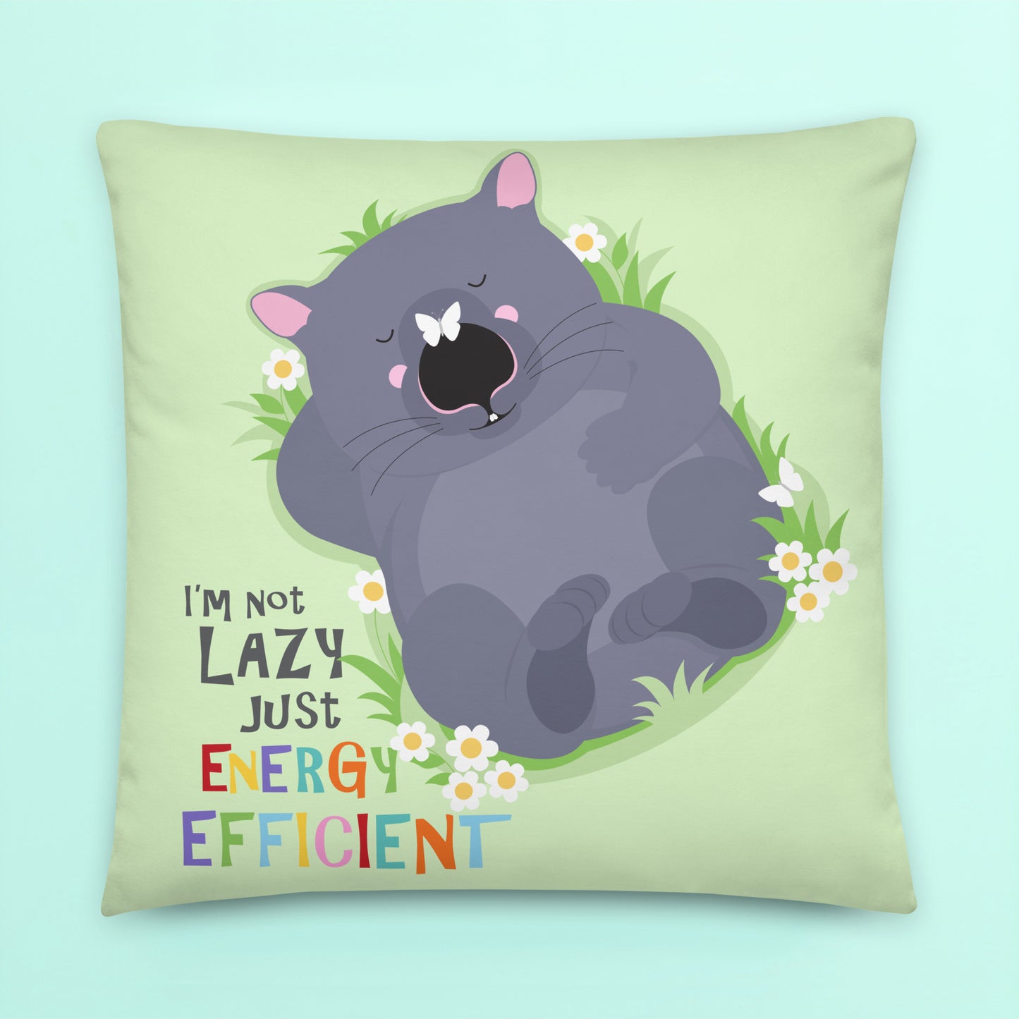 Cute lazy wombat cushion cover with sage green background, rainbow quote typography and original Australian animal illustration by Creative Monsoon. Playful nursery and kids bedroom home decor cushion with darker green reverse side.