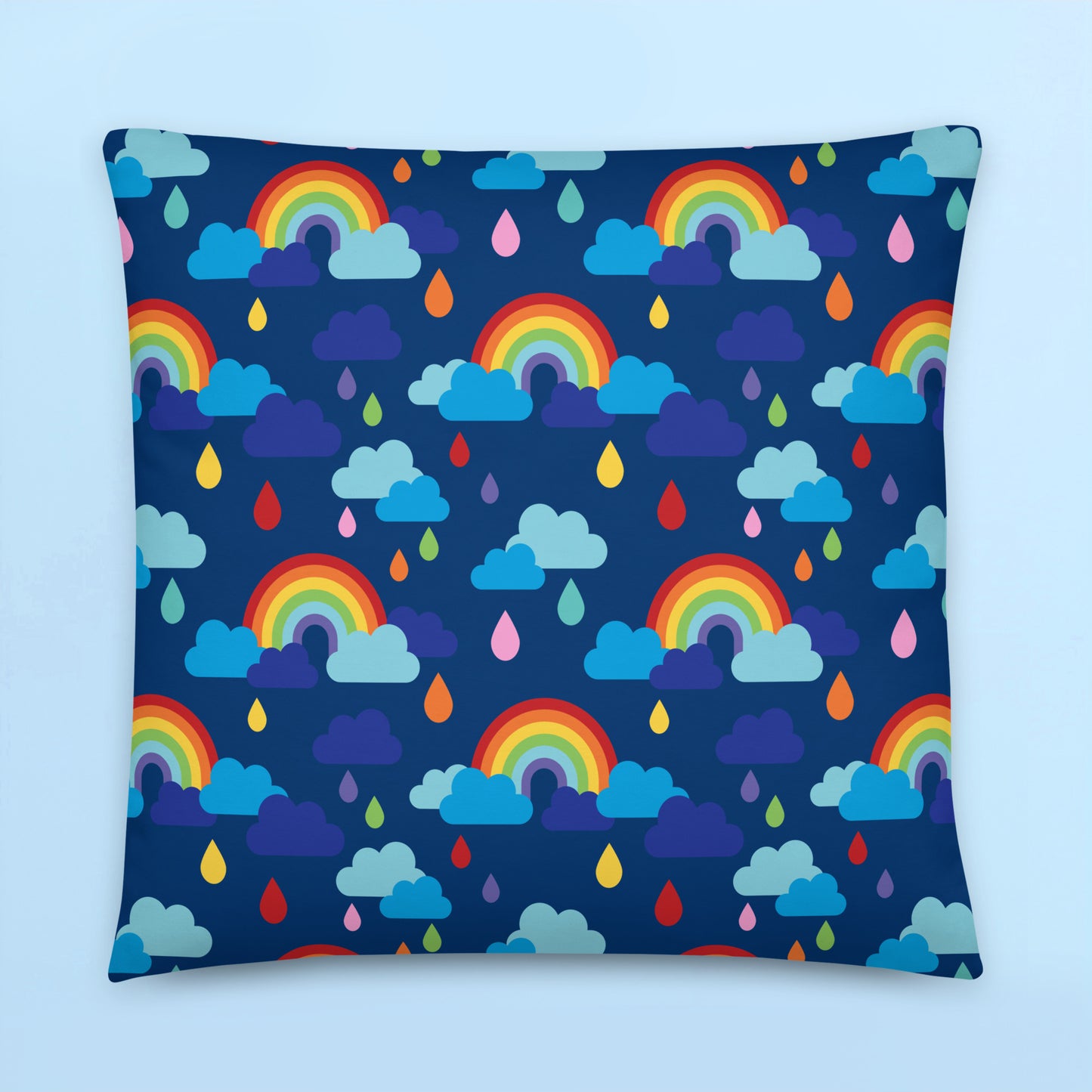 Rainbow clouds and colourful raindrops pattern cushion cover on navy blue background for colourful kids room décor