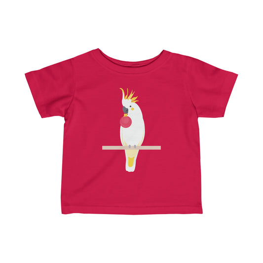 red kids t-shirt with a cockatoo perched holding a Christmas bauble