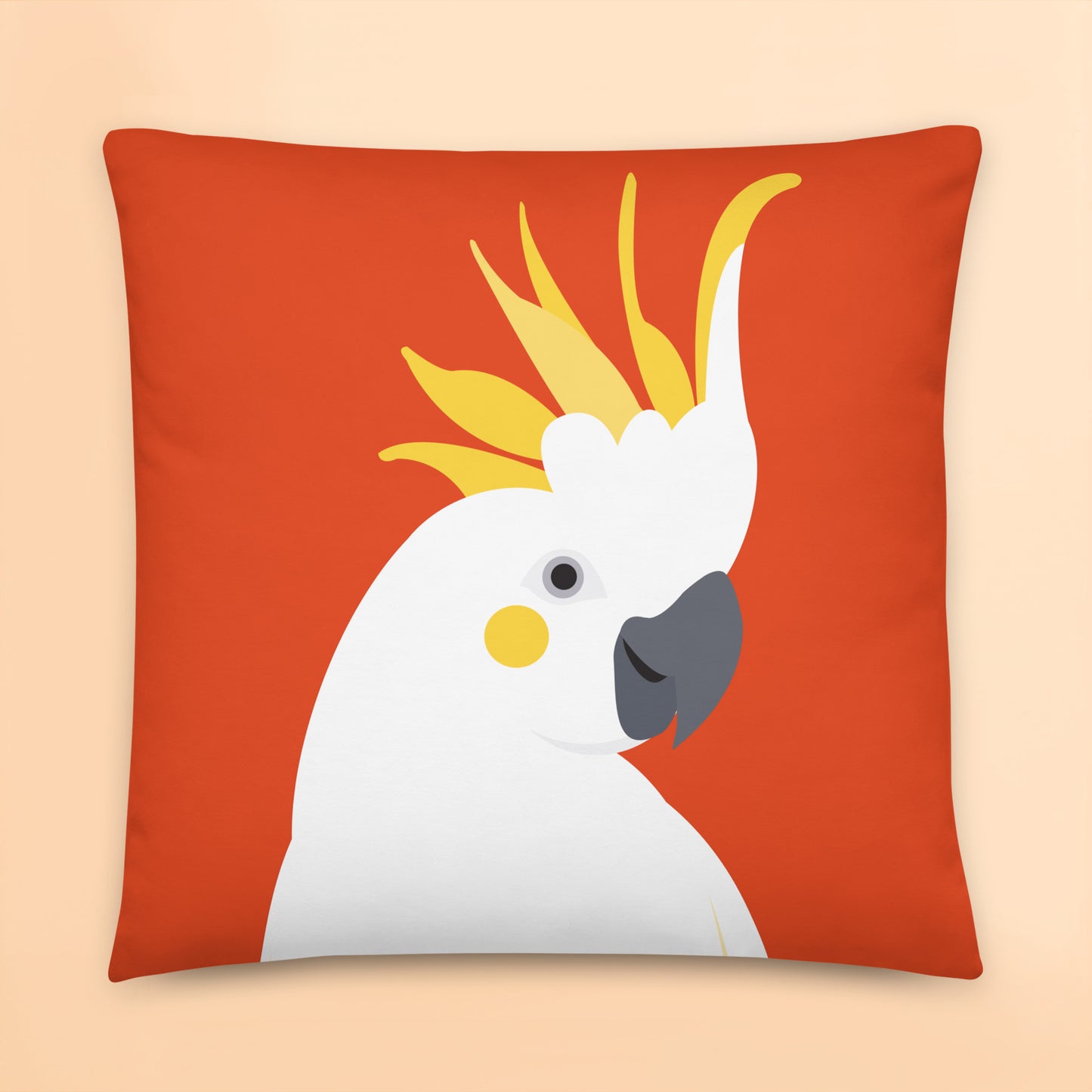 gorgeous Australian cockatoo cushion cover with bold orange background sitting on a couch