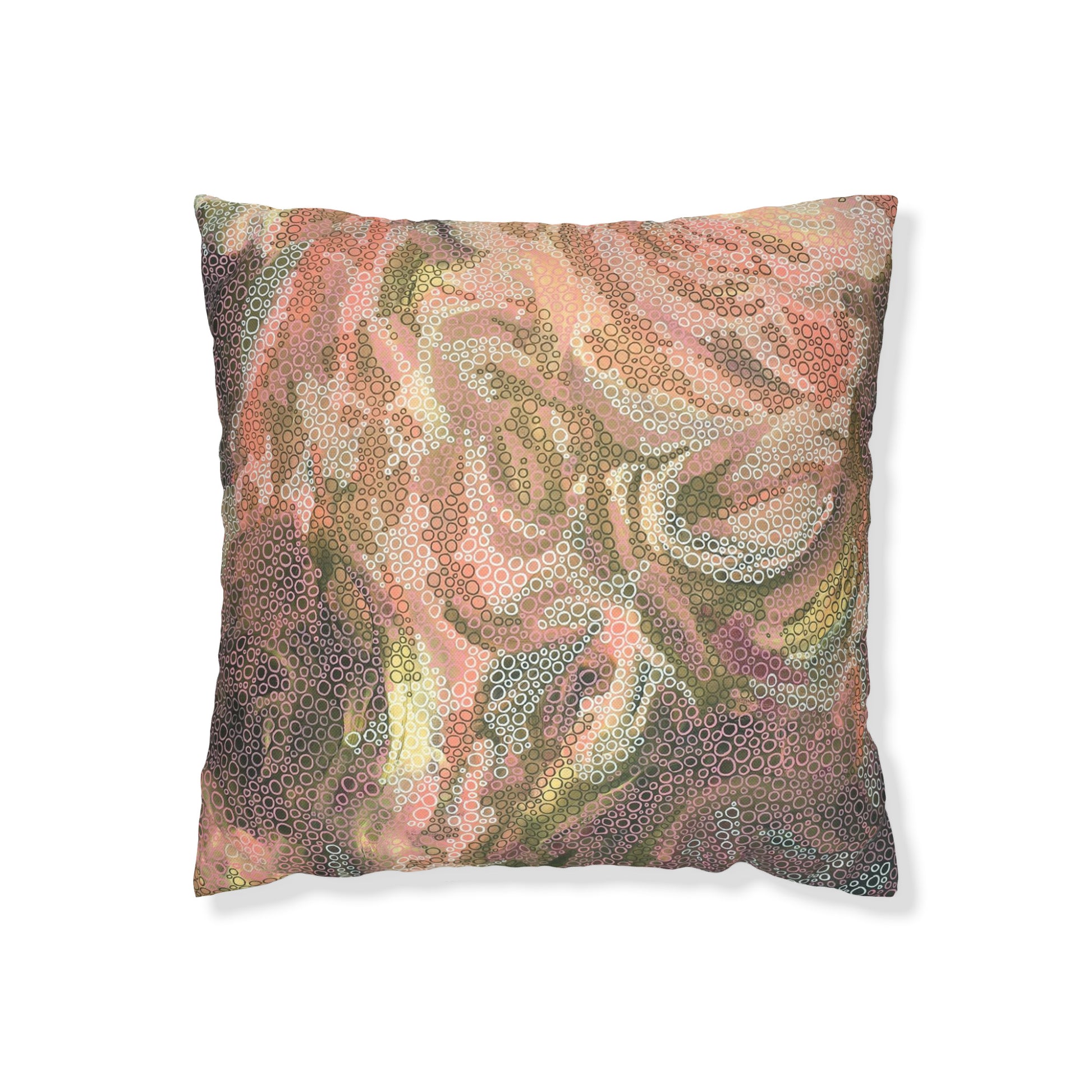 A cushion with abstract art pattern on it in earthy tones