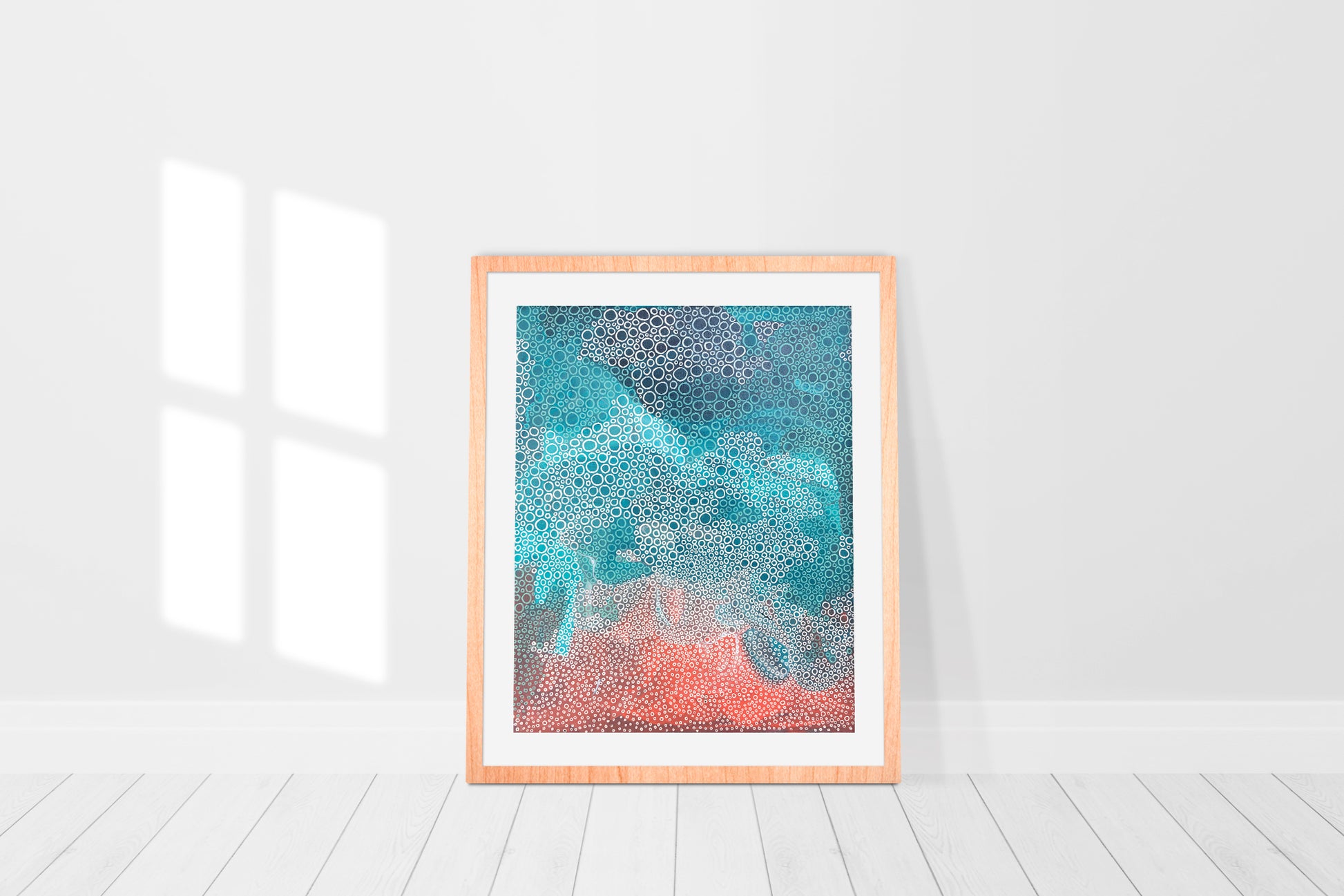 print in a frame mix of turquoises and pinks reminiscent of beach and waves