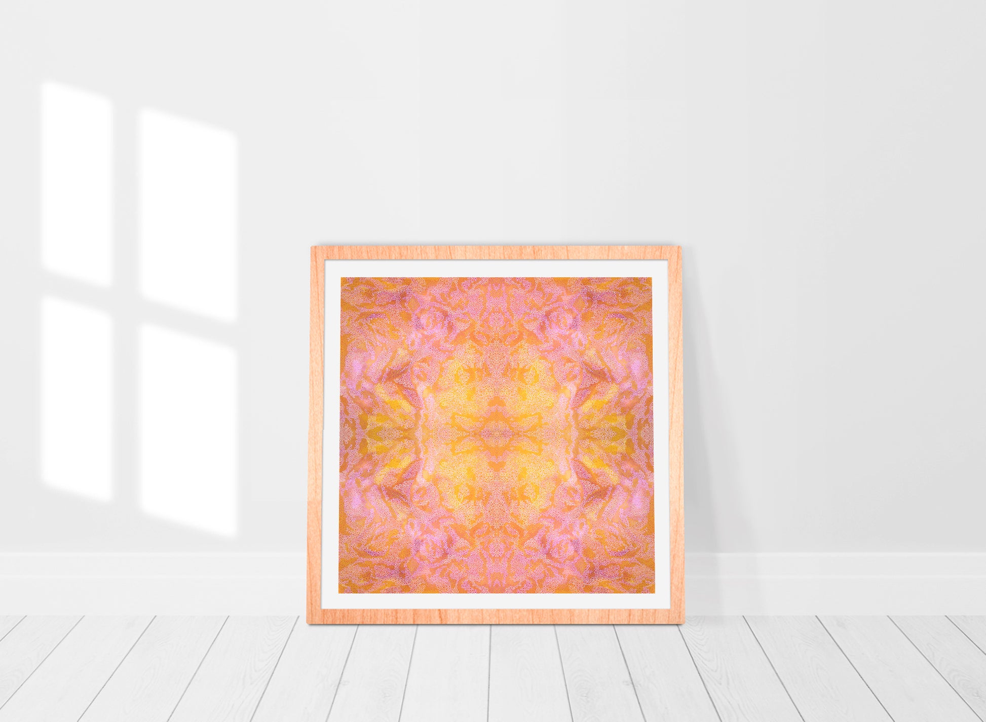 orange and yellow mandala print abstract in frame