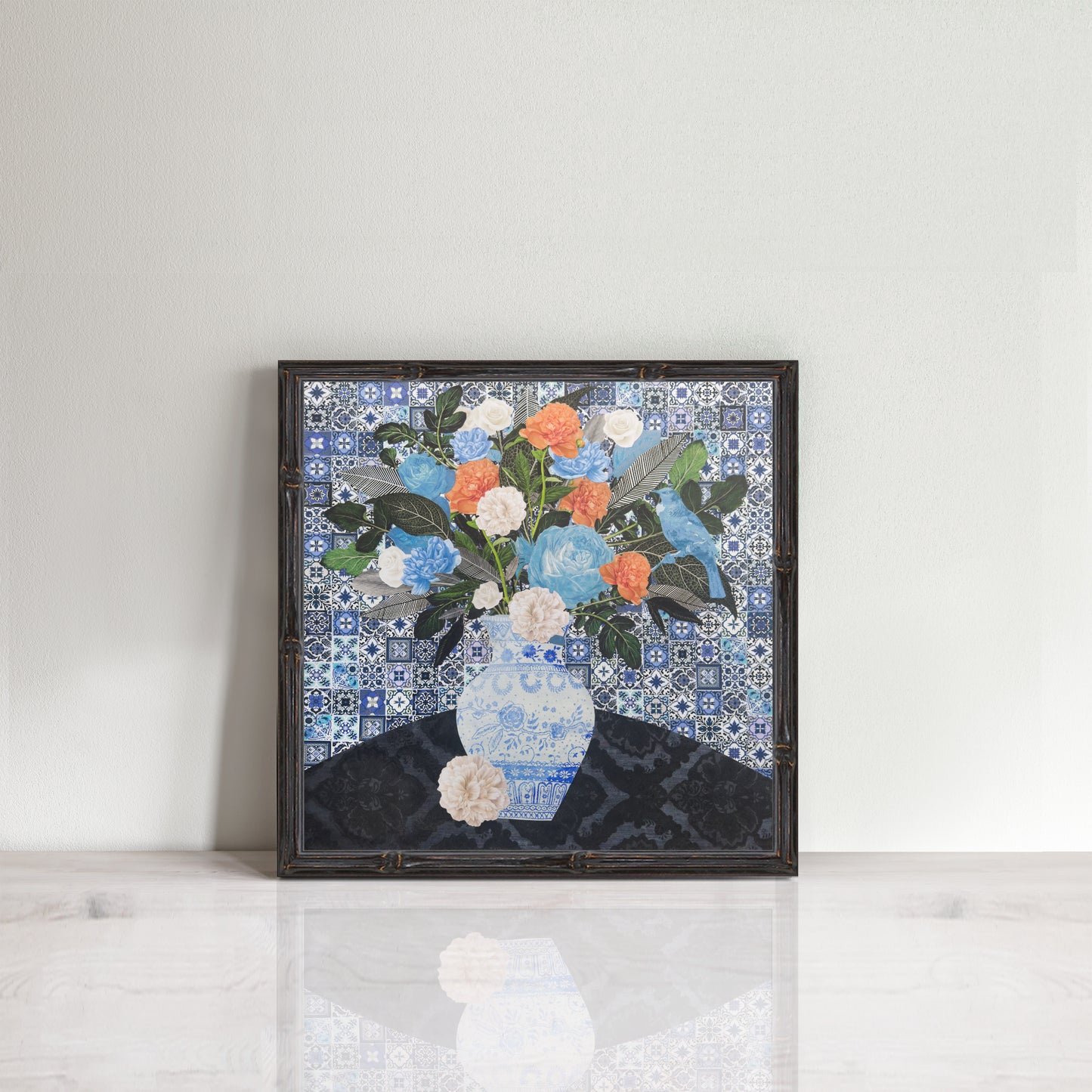 blue and apricot still life print in a frame, a collage of vintage botanical images, illustrations, and ginger jar on a Portuguese tile background