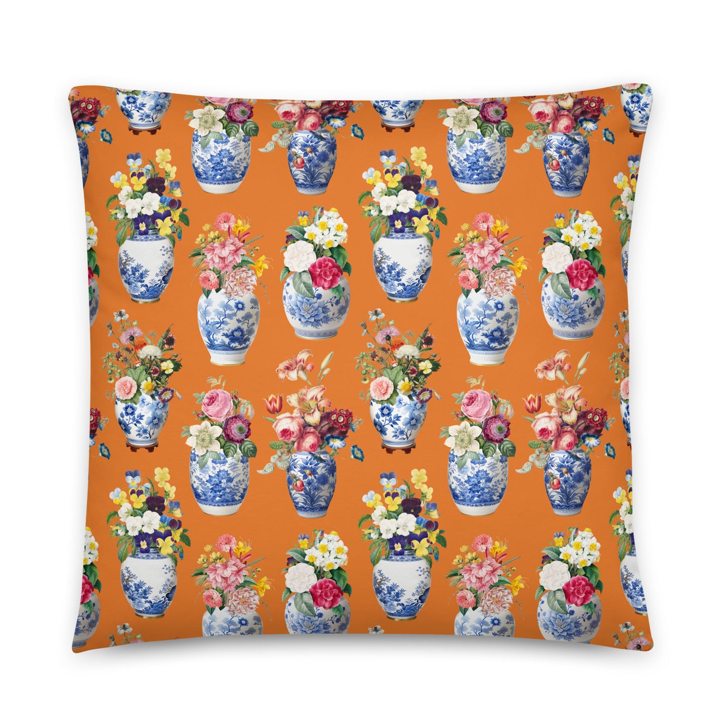 Pillow with floral and vase pattern on an orange background