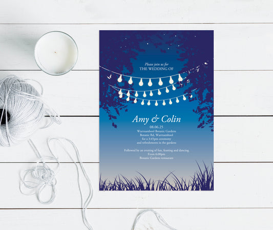invitation with With strings of party lights suspended between trees and a scattering if little stars.