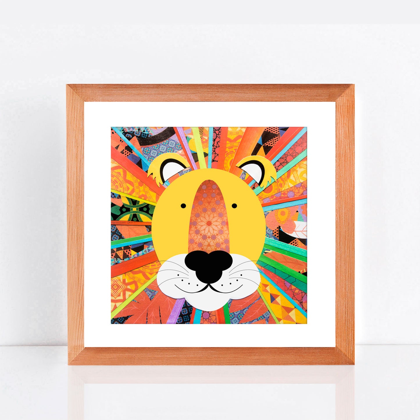 paper collage of lion with rainbow mane as a print in frame