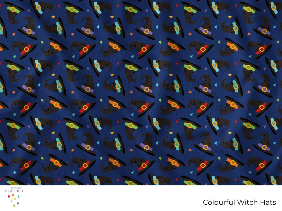 Colourful black witch hats with bright bands and stars on a navy background in a repeating Halloween surface pattern by Creative Monsoon.