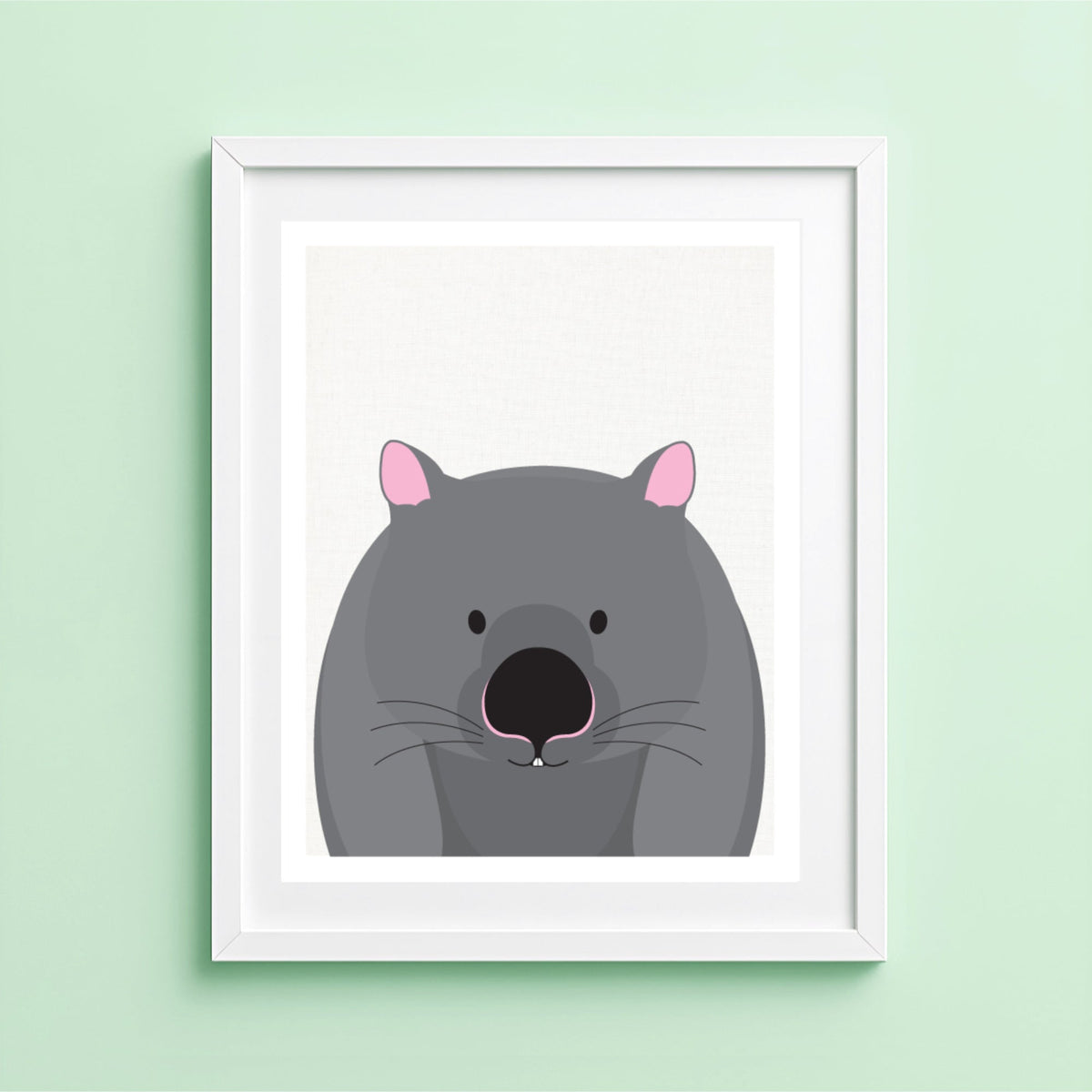 A minimalist art print featuring a gray wombat with pink ears, displayed against a light mint green wall.