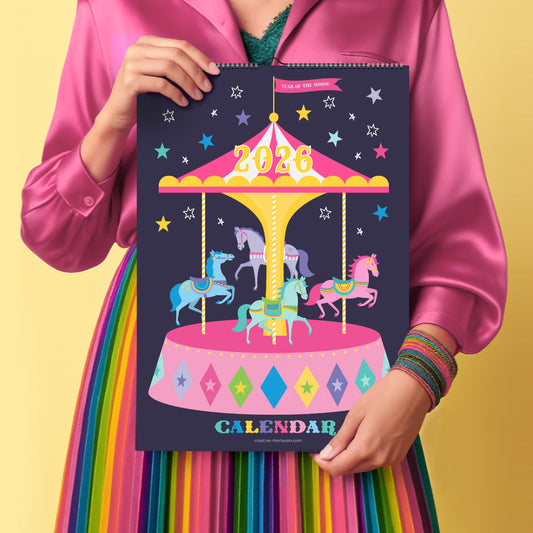 Person holding a 2026 calendar with a carousel design against a yellow background