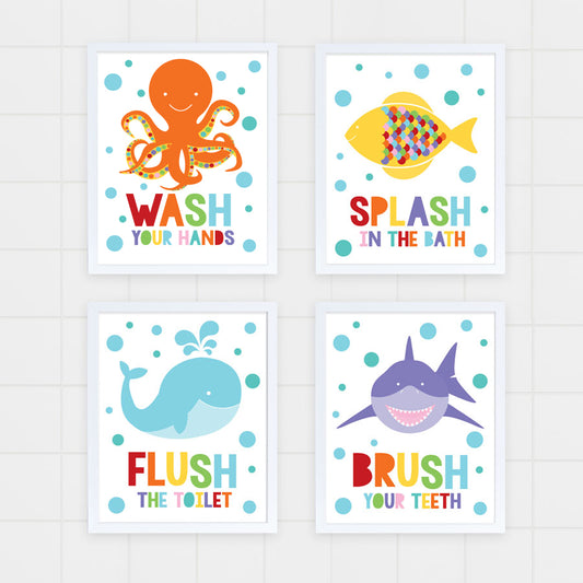 colourful set of kids bathroom prints with octopus, fish, whale and shark on white tiles