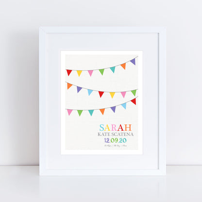 Colourful rainbow bunting with custom birth stats underneath print in frame