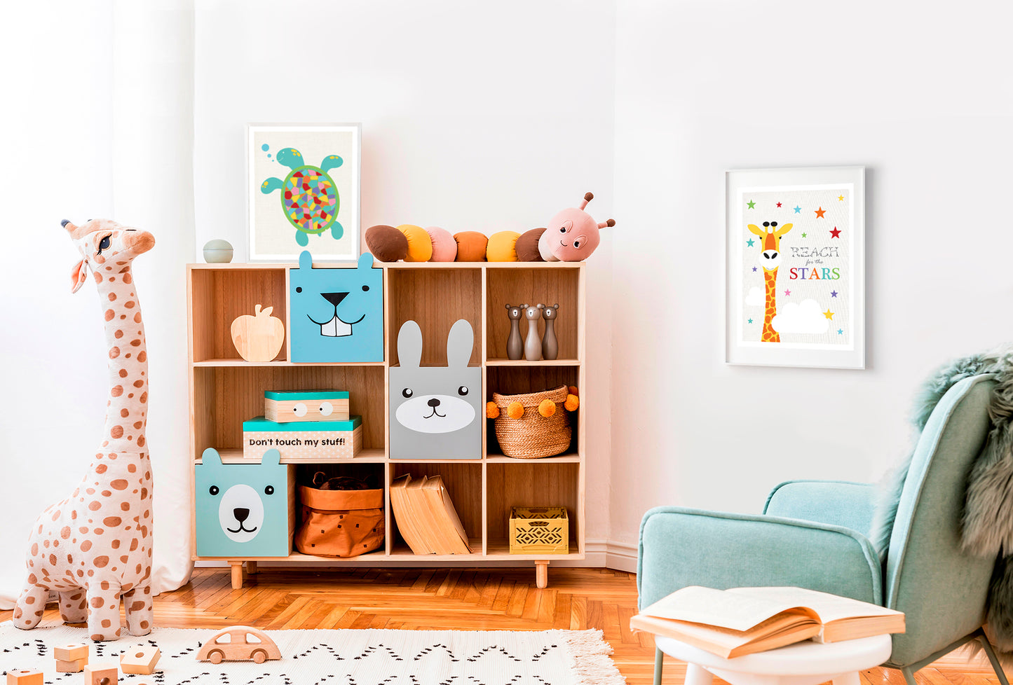 colourful kids nursery playroom with bookshelf, chair, big toy giraffe and turtle print and giraffe print
