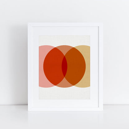 Geometric print of overlapping circles in pink orange and yellow