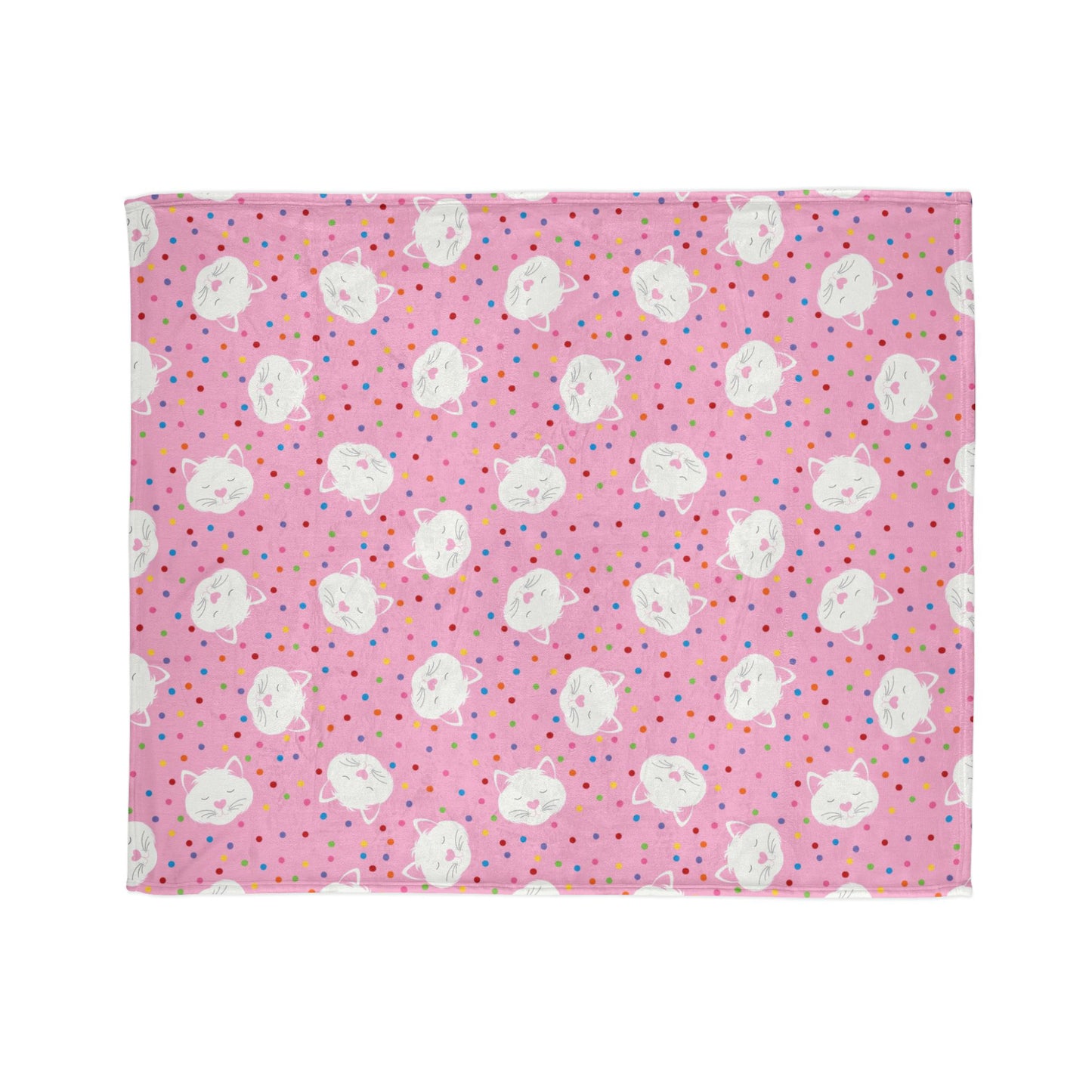 playful blanket, featuring sleepy kitty faces surrounded by bright confetti dots on a cheerful pink background