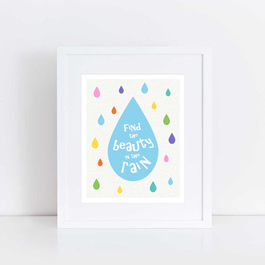 beautiful nursery print with an inspirational quote 'Find the beauty in the rain' features a scattering of colourful raindrops
