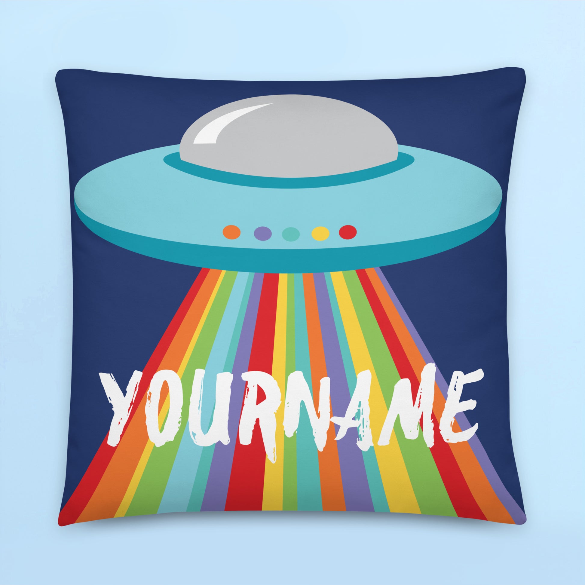 Personalised UFO cushion cover with rainbow alien spaceship design on navy blue background for colourful kids room and space themed bedroom decor.