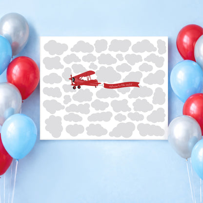 Newborn baby shower poster with red airplane and 'Welcome to the world' text, surrounded by colorful balloons on a light blue background.