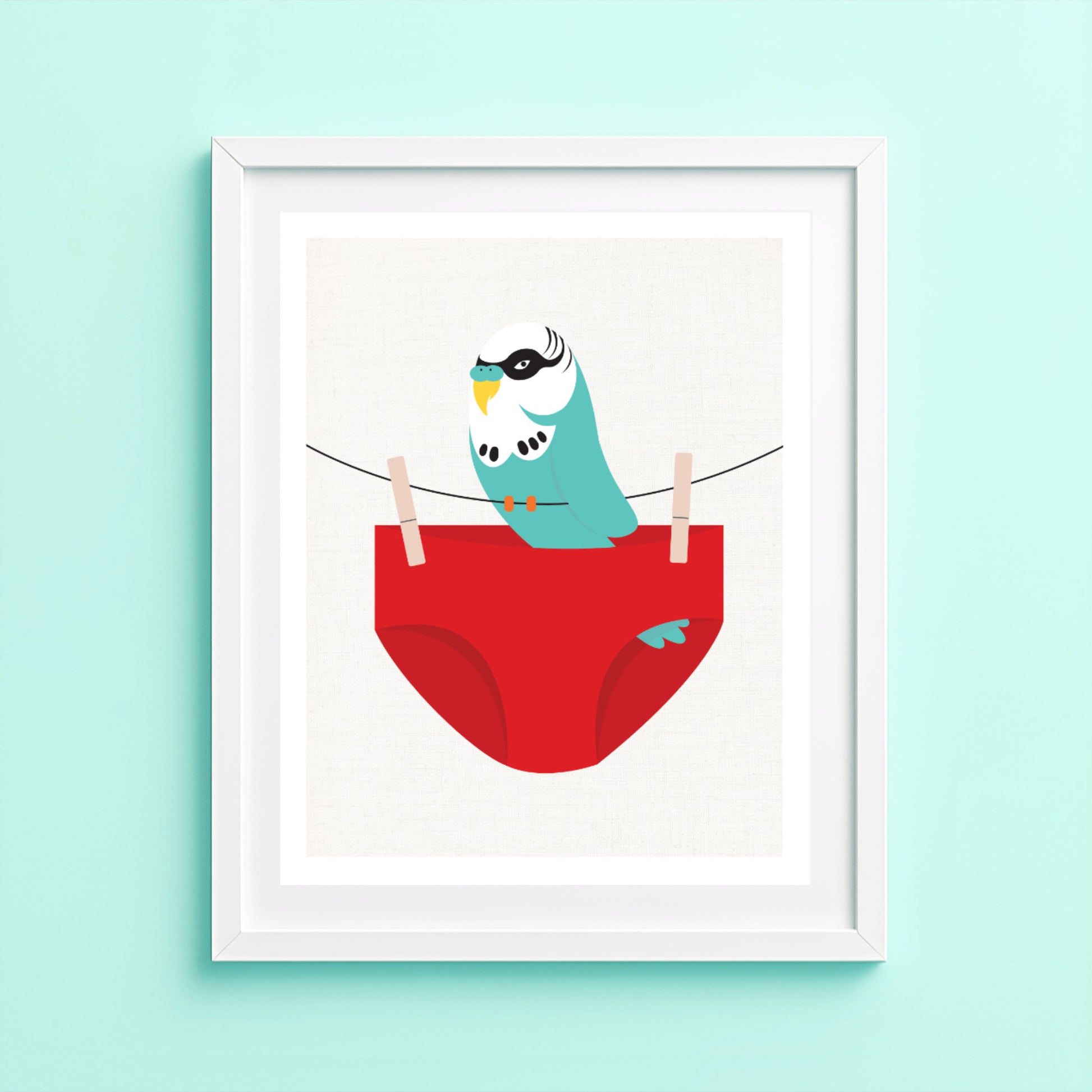 Budgie art print perched in red swimming trunks on a clothesline