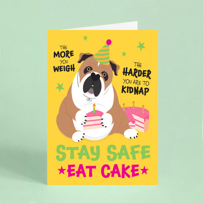 Funny English Bulldog birthday card featuring a bulldog holding birthday cake with the quote "The more you weigh, the harder you are to kidnap. Stay safe. Eat cake."