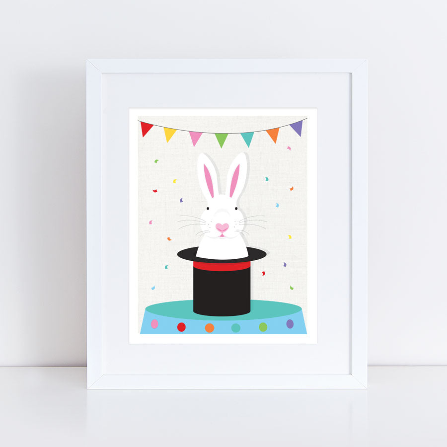 white rabbit popping out of a magicians top hat on a table with bunting above and confetti 