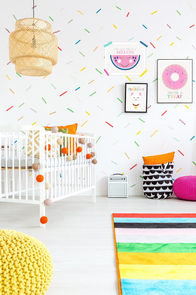 kids bedroom with colourful prints and rug