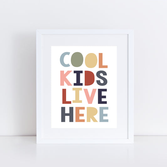 art print with COOL KIDS LIVE HERE on it