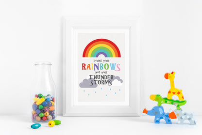  rainbow print in baby's nursery reads "Count your rainbows not your thunder storms" 