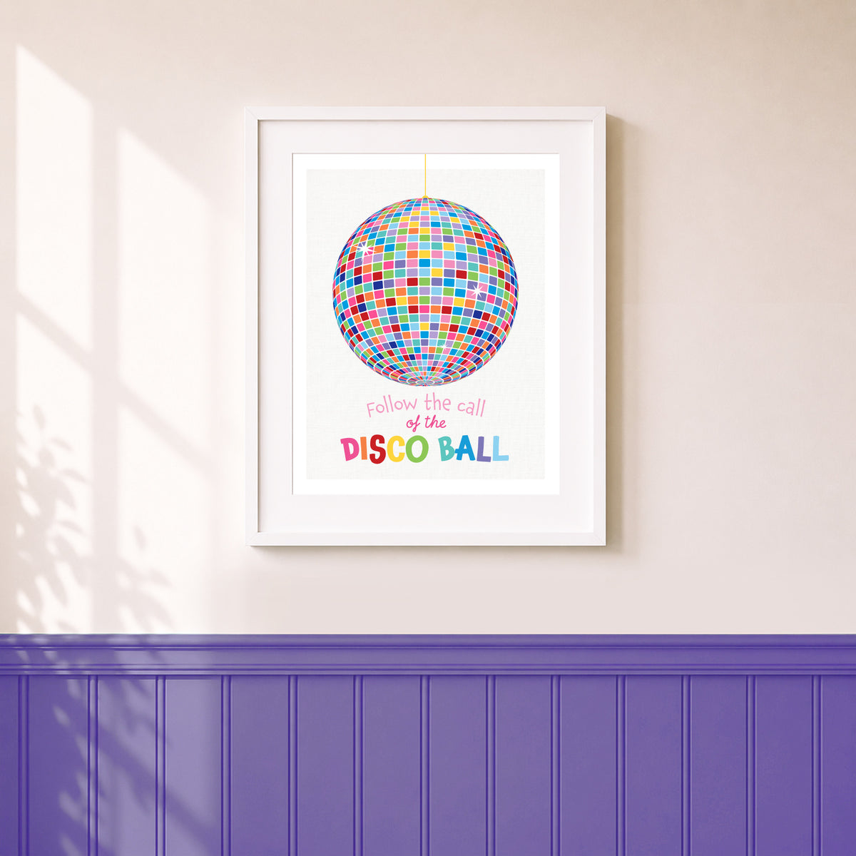 Colourful disco ball print displayed in a kids bedroom, featuring Follow the Call of the Disco Ball positive wall art.