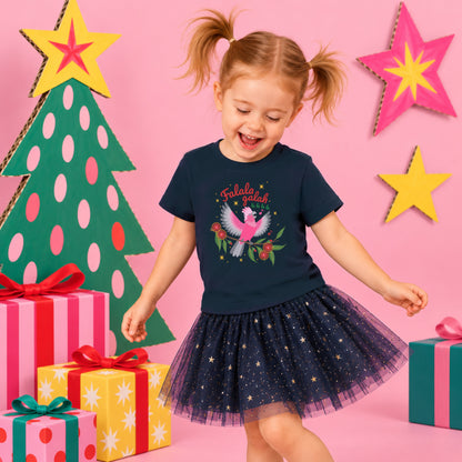Girl wearing a navy Falala Galah Christmas T-shirt with a pink Australian galah, colourful gifts and handmade Christmas props.