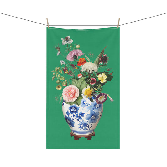 Beautiful tea towel, featuring a blue and white ginger jar filled with a vibrant arrangement of wildflowers