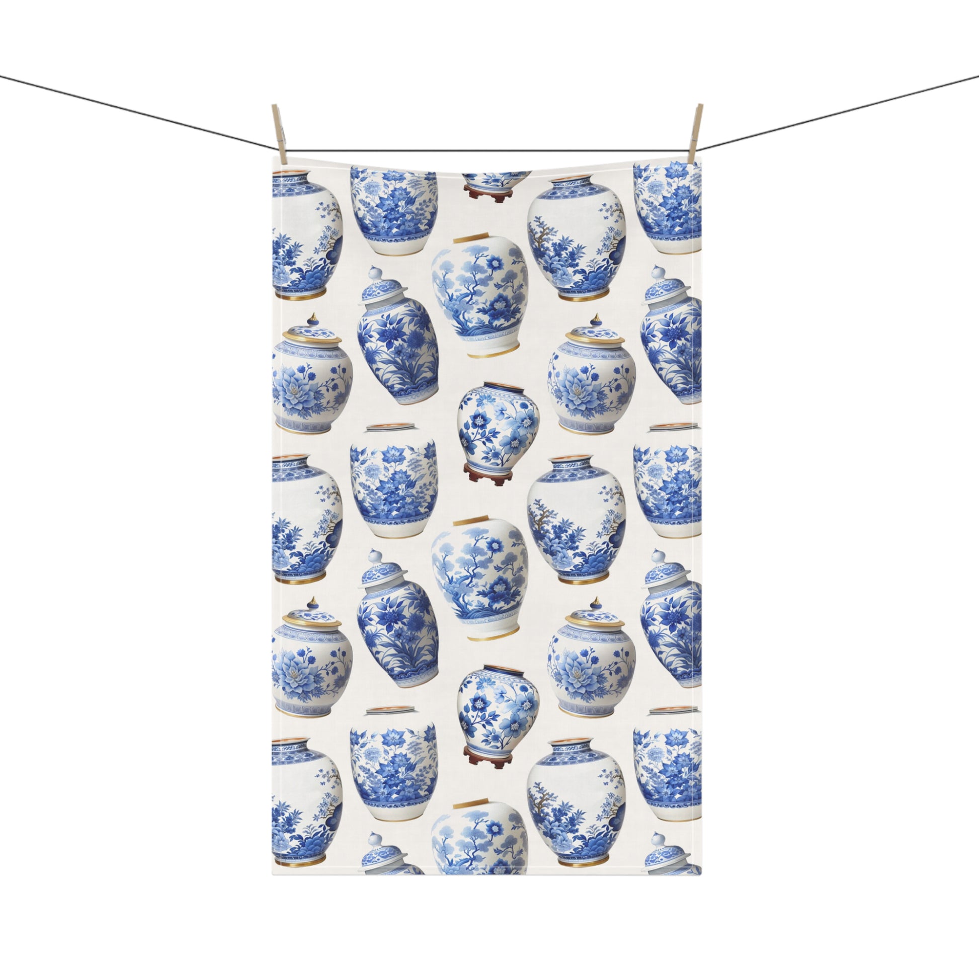  this tea towel featuring beautifully patterned blue and white ginger jars