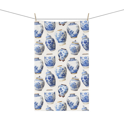  this tea towel featuring beautifully patterned blue and white ginger jars