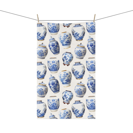  this tea towel featuring beautifully patterned blue and white ginger jars