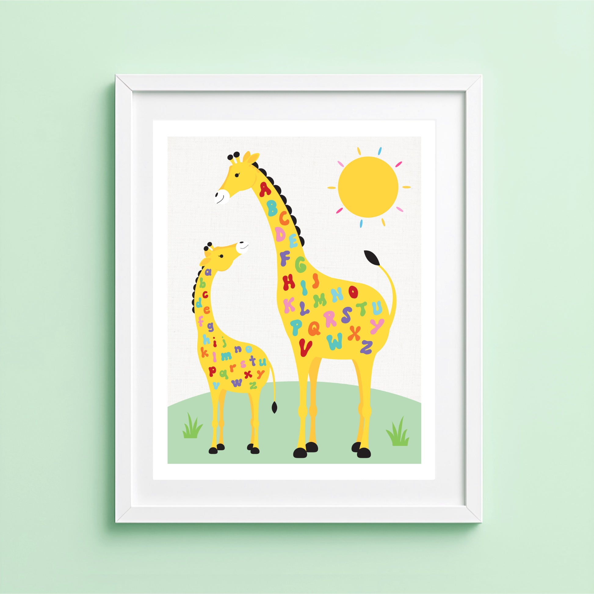 Children's illustration of two giraffes with alphabet letters on a light green background